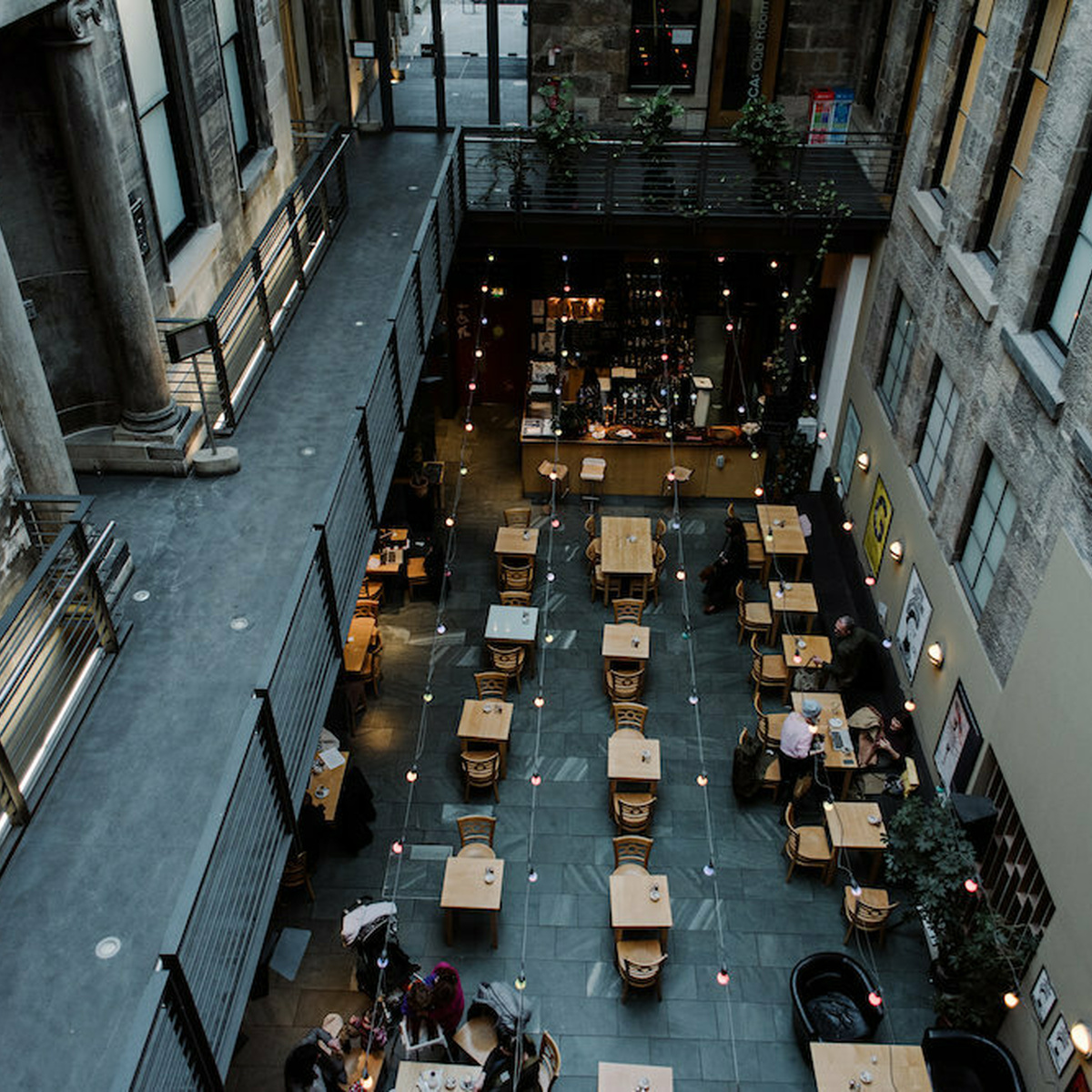 An overhead photograph taken in the building of CCA, displaying a walkway and courtyard.