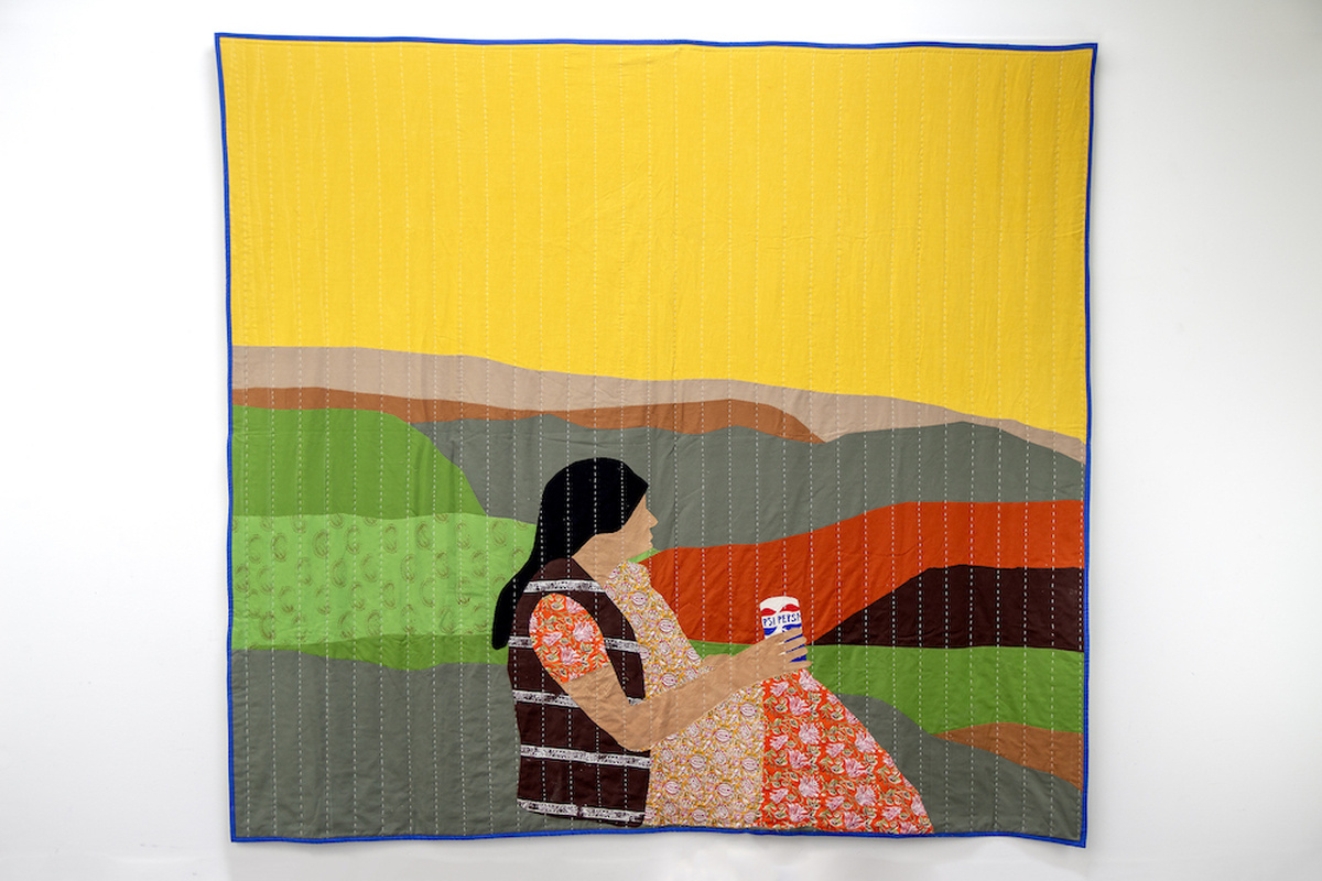 A large textile featuring a figure in a rural landscape drinking a Pepsi.