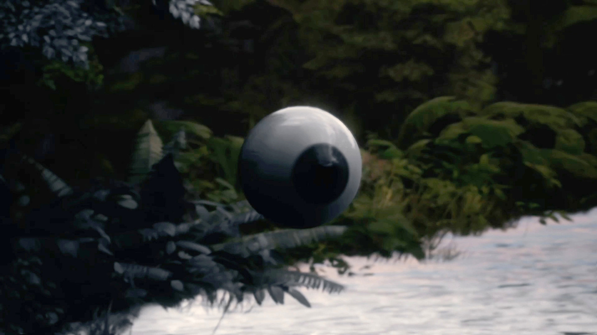 A floating eyeball situated above the water.