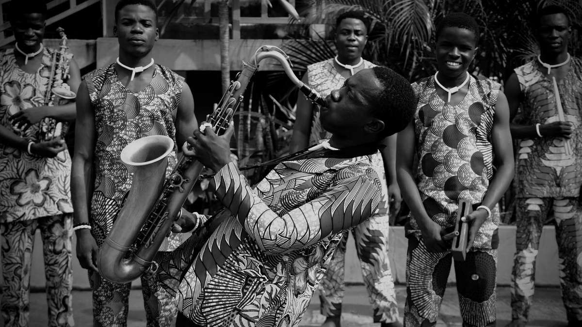 A person playing saxophone.